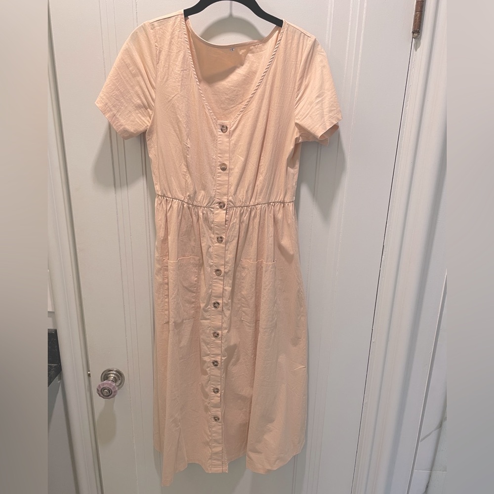 Beige cream button down cotton midi dress with pockets.